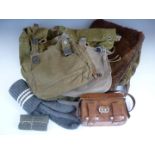 A group of Second World War German field gear including a medics pouch, tornister, 2 bread bags,