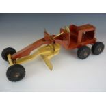 A Tri-ang tinplate toy road grader, circa 1960s