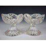 A pair of early Victorian heavy cut glass table salts, 9 cm high