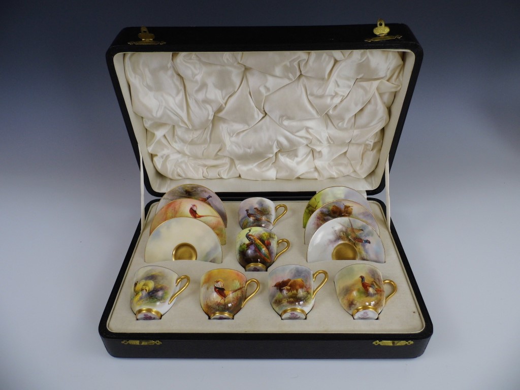 A cased 1920s Royal Worcester coffee service, comprising six cups and six saucers decorated in