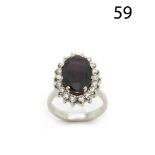 White gold, garnet and diamonds ring