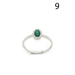 White gold, diamonds and emerald ring
