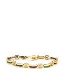 Gold, diamonds, sapphires, rubies and emeralds braceletPulsera en oro con brillantes engastados en