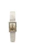 White gold and diamonds Omega wristwatchReloj Omega de pulsera para señora. En oro blanco. Bisel con