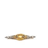 Gold, silver, citrine and diamonds needle brooch Aguja en oro y plata con centro floral, citrino