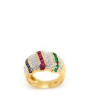 Gold and white gold, rubies, saphires and diamonds ring Sortija en oro bicolor con centro de