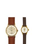 Timex and Girard Perregaux gold plated and leather wristwatch Lote de dos relojes. Timex de