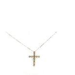 White gold and diamonds cross pendant Colgante diseño cruz en oro blanco con brillantes engastados