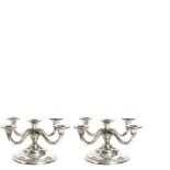 Pair of stamped silver chandeliers. Pareja de candelabros de cinco luces en plata punzonada, s.XX.