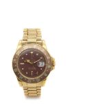 Reloj Rolex GMT-Master de pulsera para caballero. En oro. Armis no original. Esfera marrón con