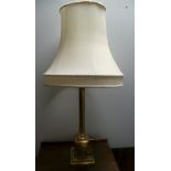 Pair of brass coated table lamps and shades