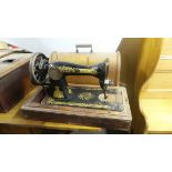 Singer sewing machine in case