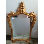 Gilt framed wall mirror