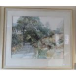 Framed watercolour of a country landscape