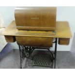 Singer sewing machine on stand