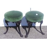 Pair of wrought iron stools with upholstered seats