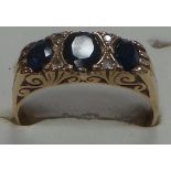 Antique style gold diamond and sapphire ring