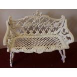 White cast iron two seater bench