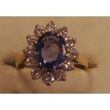 18ct diamond and sapphire cluster ring approx. 1 caret diamond , 2 caret sapphire