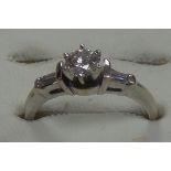 18ct diamond solitaire with diamond shoulders