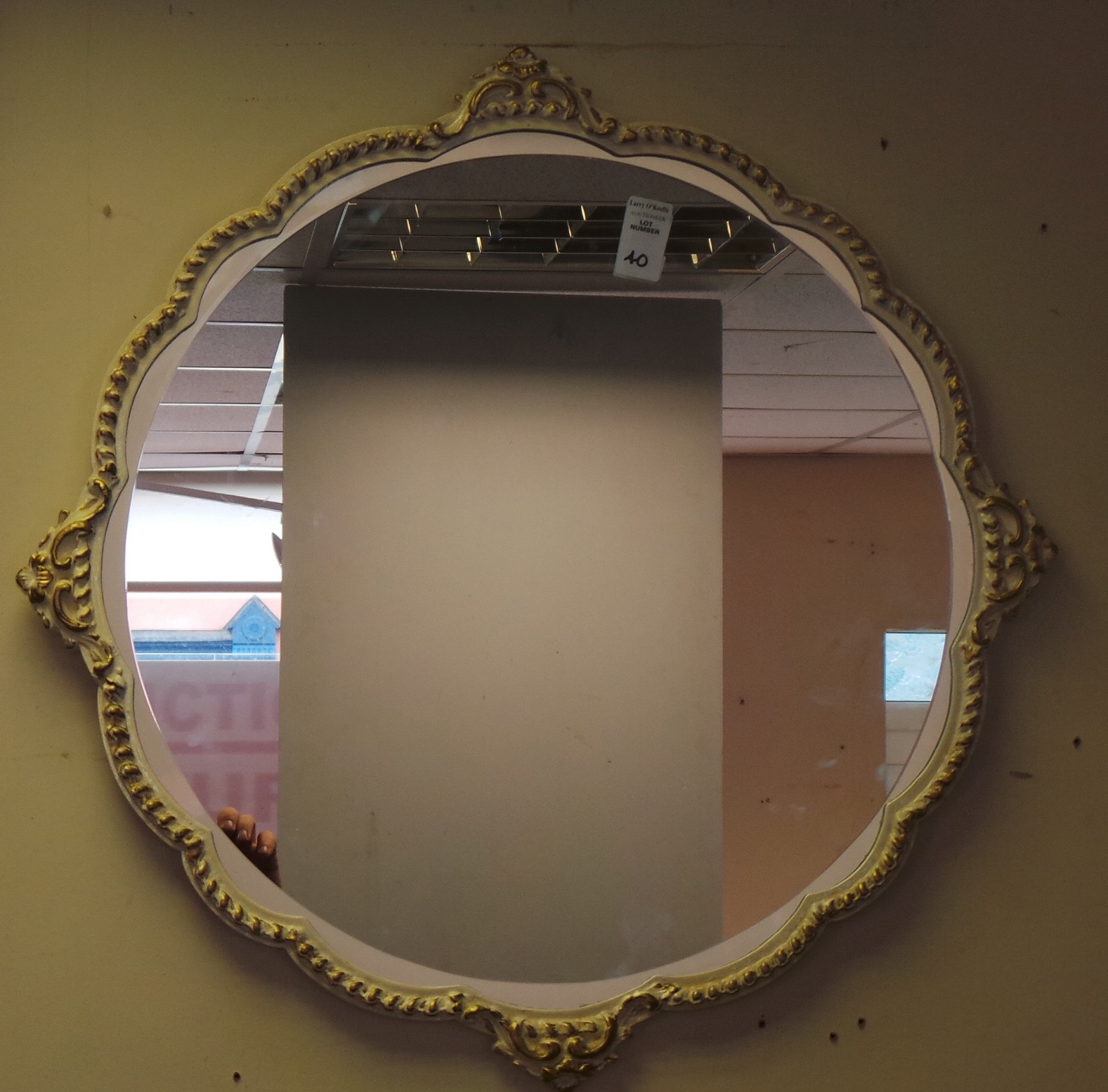 Ornate framed cream and gold ornate framed mirror