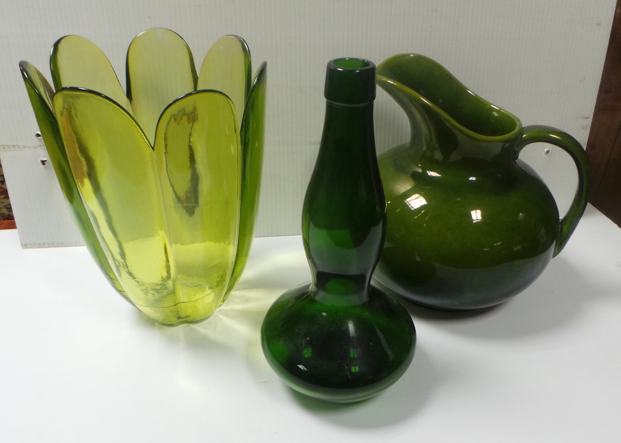 Lot comprising of green porcelain jug, lime green vase and dark green bud vase