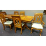 Maple extending table with 4 chairs and 2 carvers