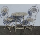 Oval table and two garden chairs