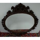 Carved mahogany wall mirror