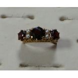 Antique style gold pearl and garnet ring