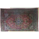Hand-woven Red ground Persian Kashan rug (2.80m x 1.92m)