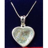 Silver stone set pendant with silver chain