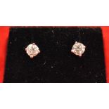 Pair of 14K diamond stud ear rings (approx. 0.30 caret content)