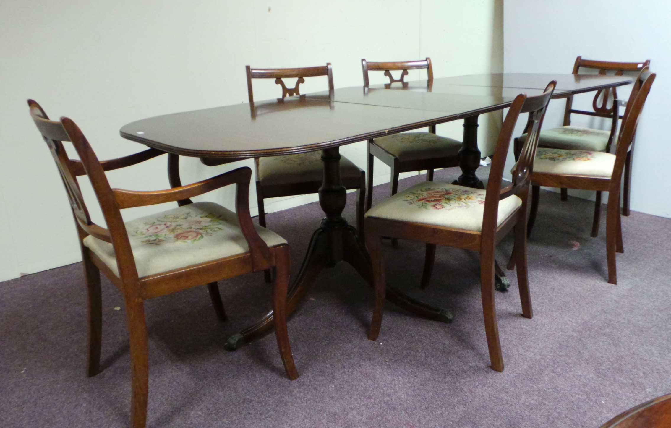 Mahogany extending table complete with 4 chairs and 2 carvers