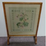 Tapestry framed fire screen