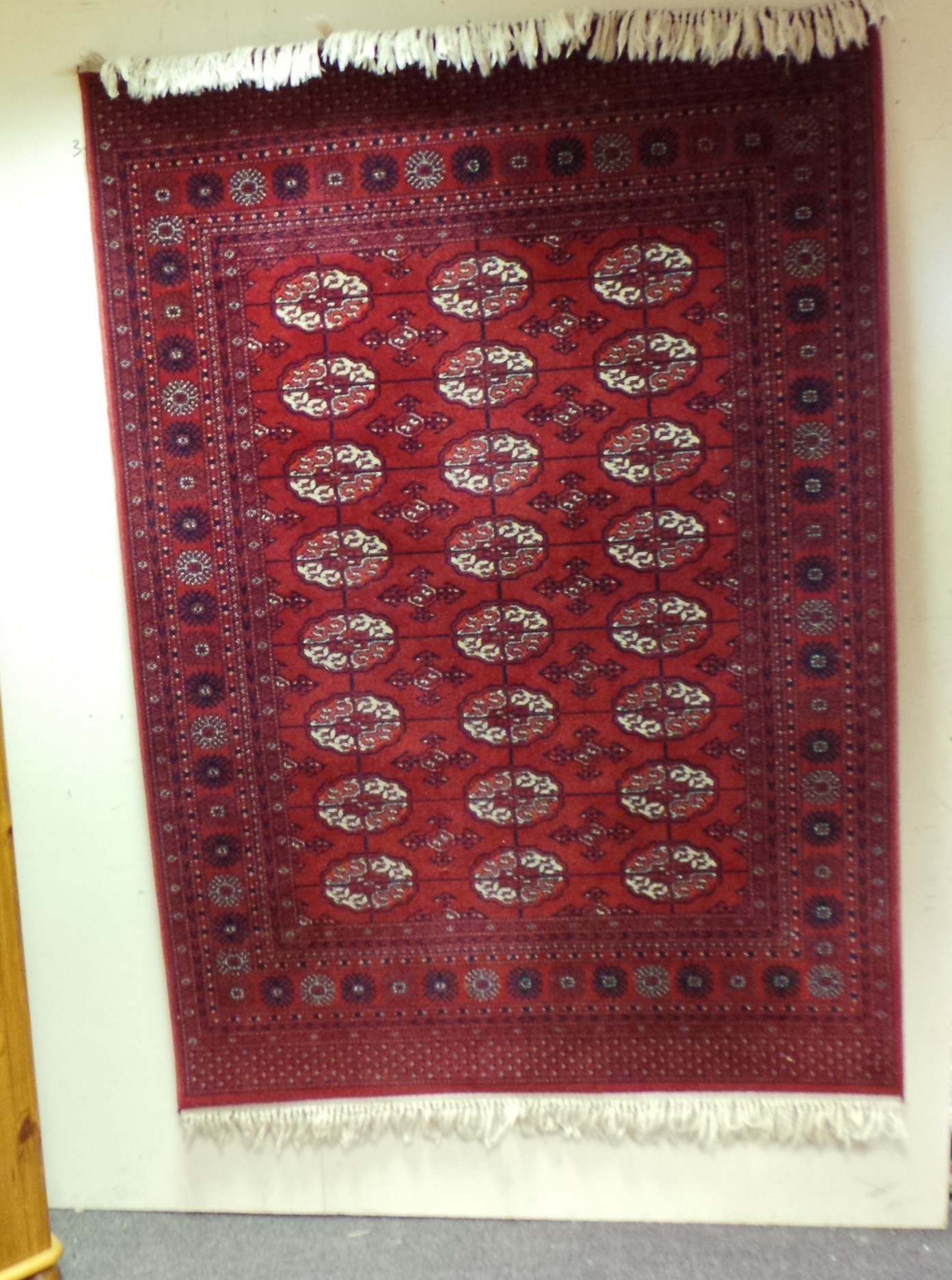 Red pattern rug (6ft6" x 4ft6")