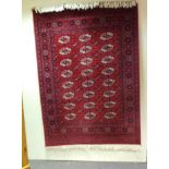 Red pattern rug (6ft6" x 4ft6")