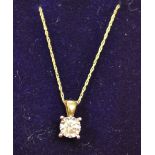 Gold diamond set pendant with gold chain