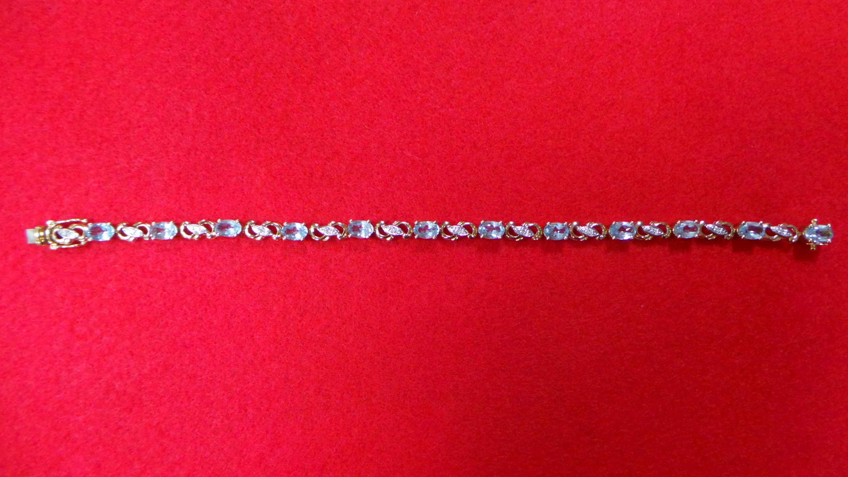 Gold diamond/aquamarine bracelet