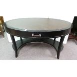 Oval leather top desk