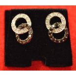 Pair white gold black and white diamond earrings