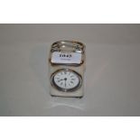 Birmingham silver rectangular cased miniature dressing table clock, the enamel dial with Roman