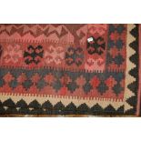 20th Century Afghan Kelim rug with geometric design in shades of pink and cream