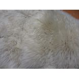 Two sheepskin rugs CONDITION REPORT Condition is ok. 3ft x 2ft each approximately