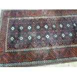 Belouch rug with all-over stylised flowe