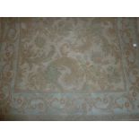 Aubusson style machine woven rug on a pa