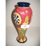 Moorcroft slim stylised tube line decorated baluster form vase, dated 2011, No. 31 out of 100