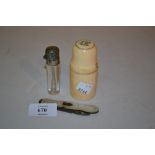 Victorian silver and mother of pearl pocket knife, a white metal mounted perfume bottle and an