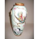 Art Union baluster form vase decorated with an exotic bird and flowers in oriental style
