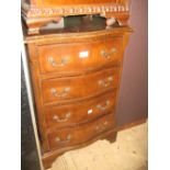 Small reproduction mahogany serpentine fronted chest of four drawers together with a pine wine